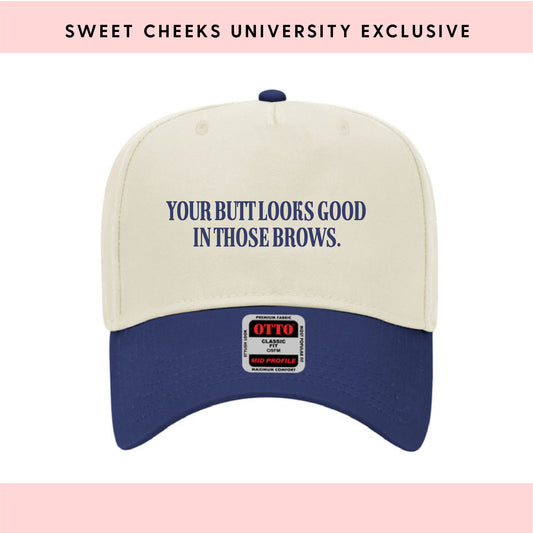 YOUR BUTT LOOKS GOOD IN THOSE BROWS - Trucker Hat by Sweet Cheeks University
